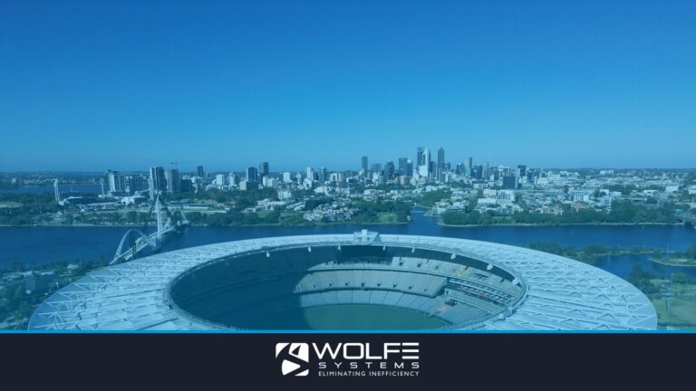 Stunning aerial view of Optus Stadium in Perth, Western Australia with city skyline backdrop.