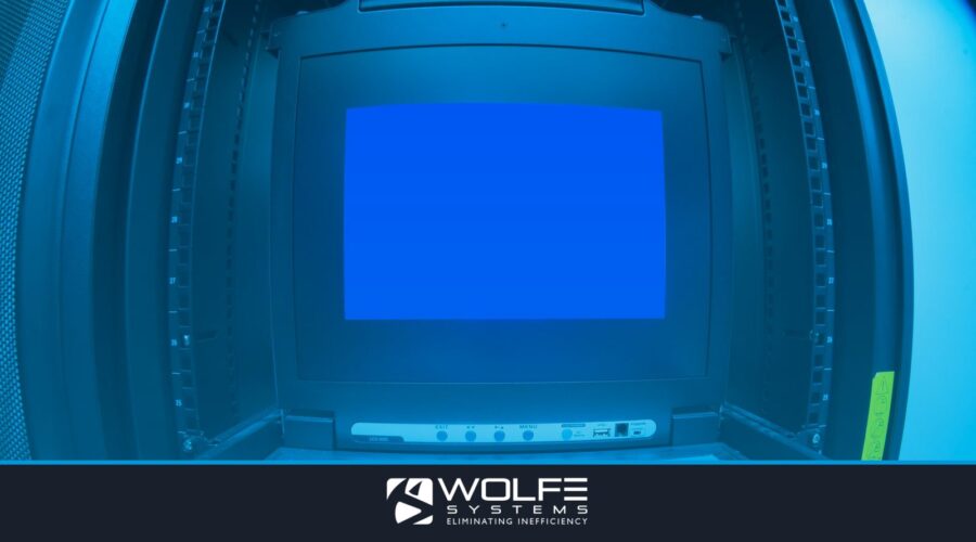 Close-up of a blue screen error shown on a data center control terminal.