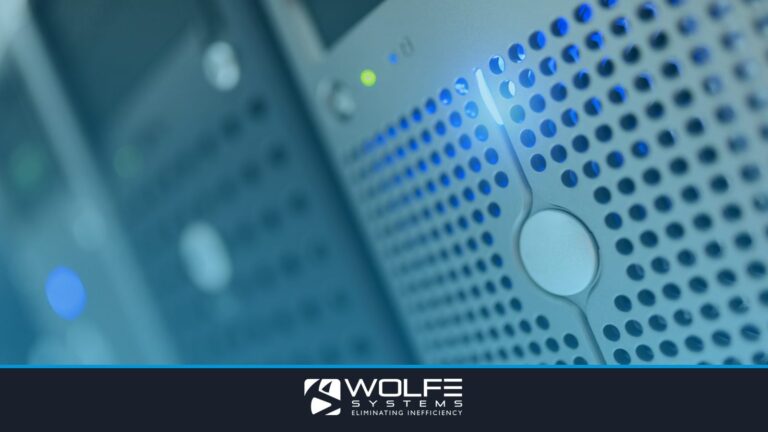 Focused detail of a modern server rack with blue LED indicators in a data center.